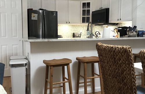 Diamond Beach House | Sunny family owned corner unit town home one block from exclusive Diamond Beach