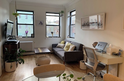 Greenpoint Apartment | Sunny, quiet Greenpoint 1-bed - shared rooftop with Manhattan skyline views.