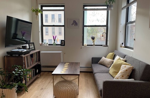 Greenpoint Apartment | Sunny, quiet Greenpoint 1-bed - shared rooftop with Manhattan skyline views.