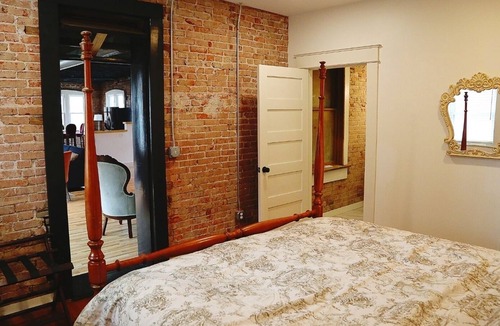 Bartlesville Apartment | Swanky downtown Loft fit for a king! History and Luxury for a perfect getaway