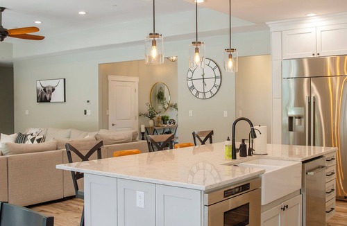 Denton House | The Wilder Way with a beautiful pool, hot tub, and a pickleball court!