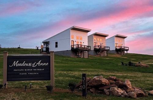 Court House Apartment | Thoughtfully designed two-bedroom retreat in Floyd, Virginia featuring mountain views, a private deck, full kitchen, and shared fire pit access just minutes from downtown Floyd.