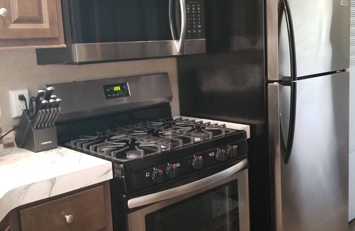 Phenix City House | Tiny Park Home, deck, grill, hammock, trailer parking, 14 miles to Ft Benning