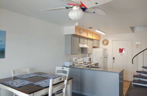 North Ocean City Condo | Two-level condo with balcony, AC, pool & dock - blocks to beach/Northside Park