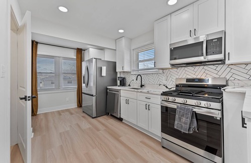 Northeast House | Unwind in our bold + stylish 4BR, 2BA DC gem!