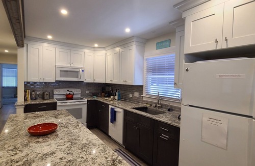 Gold Coast Condo | Updated 1st floor fully furnished Duplex one block off beach!