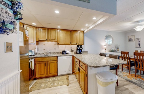 Midtown Ocean City Condo | Updated ocean-view condo with beach access, patio, central AC & washer/dryer