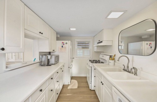 Manasquan House | Wake up to ocean views at this spacious 5BR beachfront home, just steps from the sand. Perfect for families and groups, it offers direct beach access, comfortable living spaces, and the ideal setting for a relaxing coastal getaway.