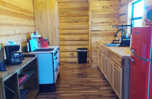 Grove Cabin | Waterfall View Cabin at White Buffalo Lodge; Family-friendly with lake access
