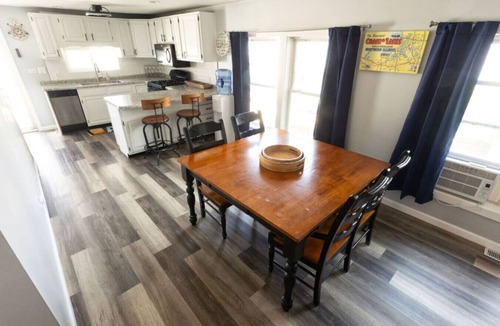 Solon Mills Cottage | Waterfront 2BR Nautical Cottage on Grass Lake - Hot Tub, Firepit & Year-Round Fun