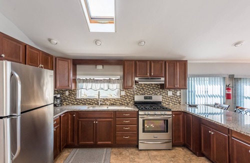 Ocean Beach I House | Waterfront Escape with Private Dock, Sunset Views, and Beach Badges!
