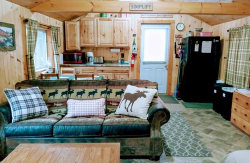 Woodsville Cabin | White Mountain scenic river camp with cozy cabin & comfy RV