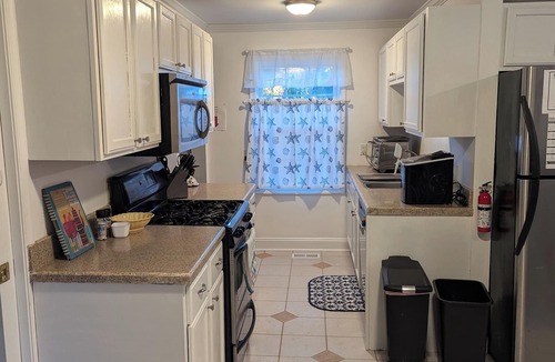Somers Point House | Your family will be close to everything Steps to the Somers Point beach and nightlife.