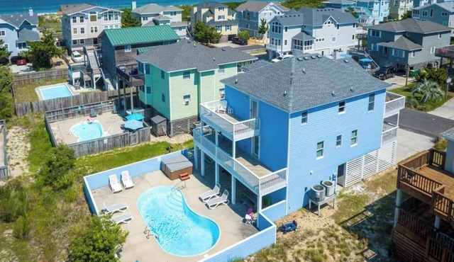 1 min private beach walk. Stylishly renovated with beach views! Hot tub & pool!