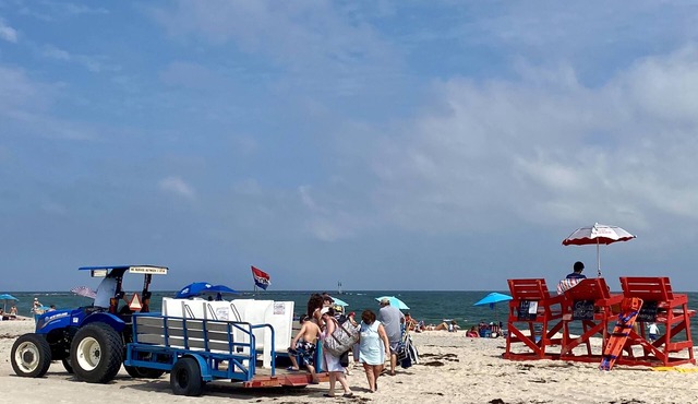 2nd in from the Ocean with Bikes and Beach Chairs.