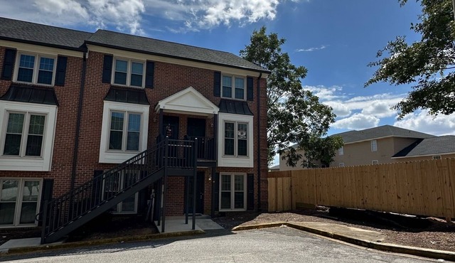 A quick 1/2 block from campus perfect location WALK to Football Games