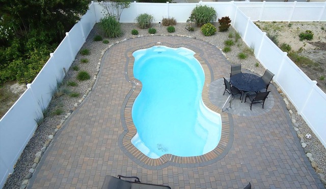 Beautiful 8 bedroom, 4 full and 3 half baths with private inground pool
