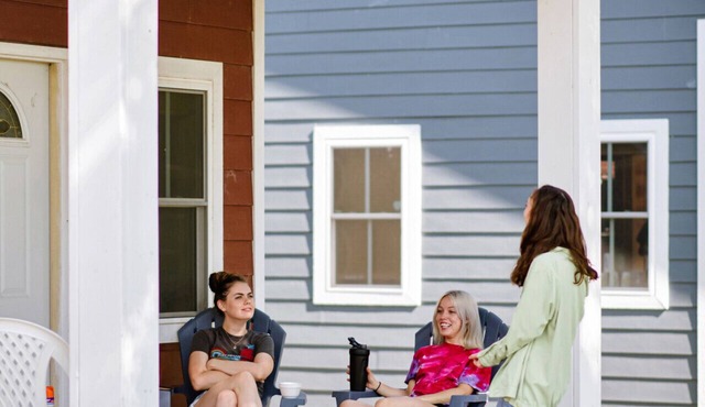 Cottages inspired by the performing arts heritage of Okoboji Summer Theatre