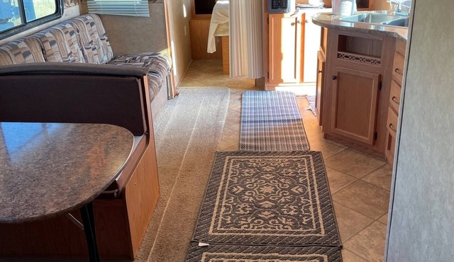 Cozy RV on working ranch in Akron/Otis area with AC