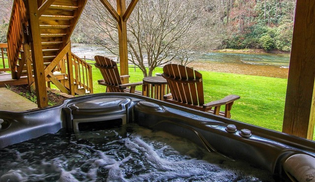 Discover Your Cool Escape - 4BR/2BA Riverfront w/Hot Tub, Near Zaloo's!