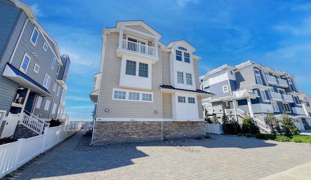 Experience coastal living at its finest in this newly remodeled, designer-appointed bayfront townhome.