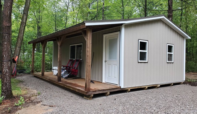 Great camping location will full hook up and tiny guest house!