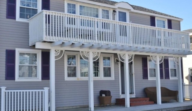 Great views for this Ocean block Brighton Beach 1st fl duplex. Only 3 from.