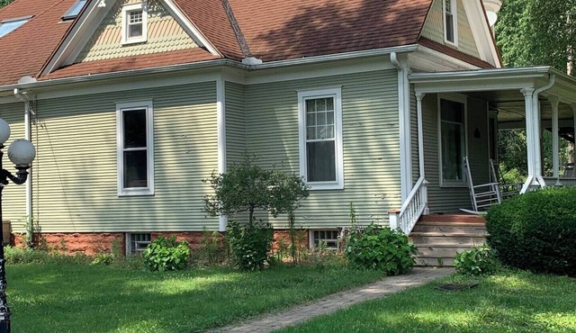 Historic Victorian Estate Wrap-Around Porch Steps from John Deere Site