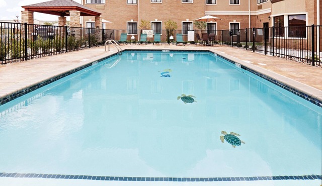 King Suite. Free Breakfast. Outdoor Pool, Gym, Business Center.
