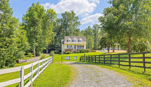 Lakeview escape near beach with fenced dog run, porch & dock with one boat slip