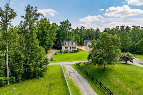 Lakeview escape near beach with fenced dog run, porch & dock with one boat slip