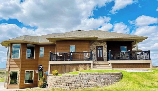 Large Bayside Golf Course home with Lake Views.