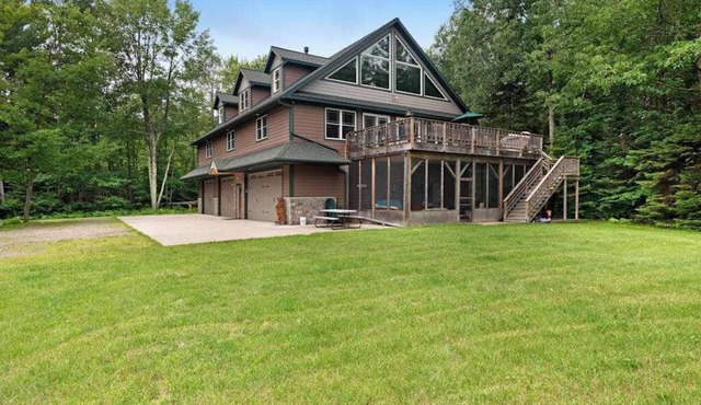 Large, waterfront home w/a full kitchen, dock, canoes, & outdoor firepit in Tomahawk