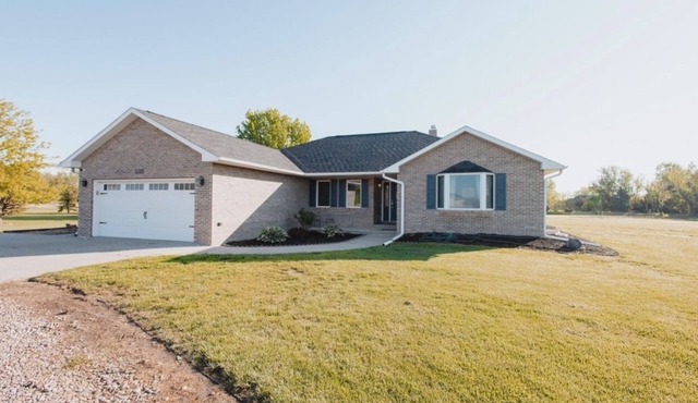 Peaceful neighborhood OUTSIDE of Kearney and one of the LARGEST homes available.