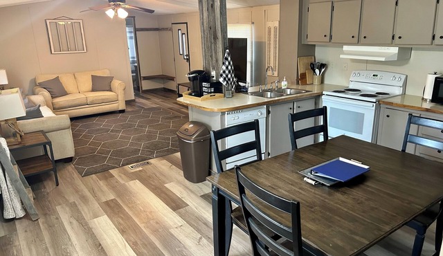 Quiet farmhouse getaway with deck, cornhole, firepit and Santa Fe Trail Marker.