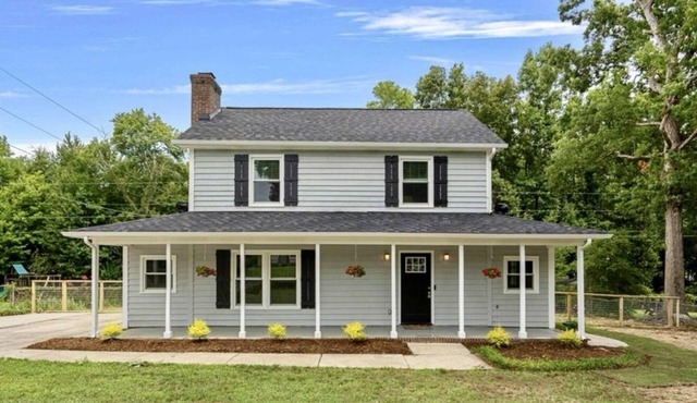Red Lantern Farmhouse with Tesla Charger!