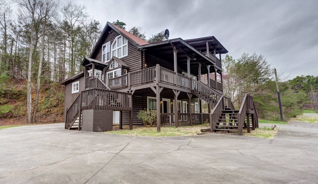 Roomy, three-story mountain home with two full kitchens, game rooms, & AC