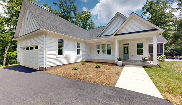 Spacious lake house retreat with game room, theater room, fire pit and boat slip