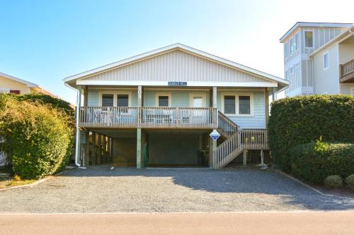 Stay at Bunker Hill, a spacious 4-bedroom oceanfront house in charming Topsail Beach!