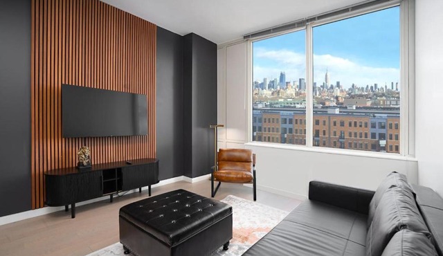 Stylish 1BR Retreat - Stunning NYC Views