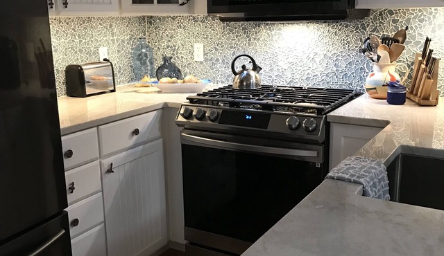 Sunny family owned corner unit town home one block from exclusive Diamond Beach