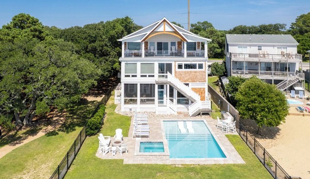 Sunset Bay 5 Bedroom Home with a Jacuzzi Tub, Work-Out Room and Bayside Access!