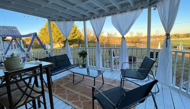 Trendy home with a scenic back porch, fish, golf pickle ball and more