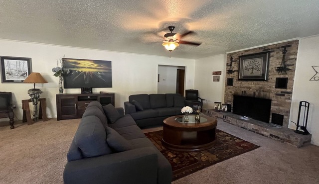 Two bedroom House with fenced in yard, covered patio area, located at the Joplin Inn at the entrance to Mountain Harbor, just 1 1/2 miles from Lake Ouachita. by RedAwning