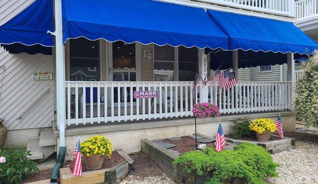 Updated 1st floor fully furnished Duplex one block off beach!