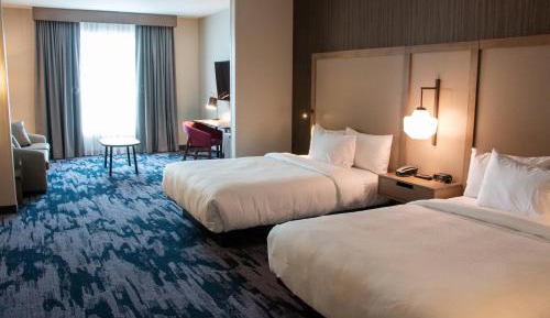 Queen Suite with Two Queen Beds, Roll-In Shower and Sofa Bed - Mobility Access