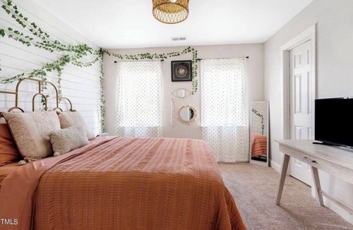 Garner House | Tucked away in the forest on over an acre,perfect for a cozy family getaway